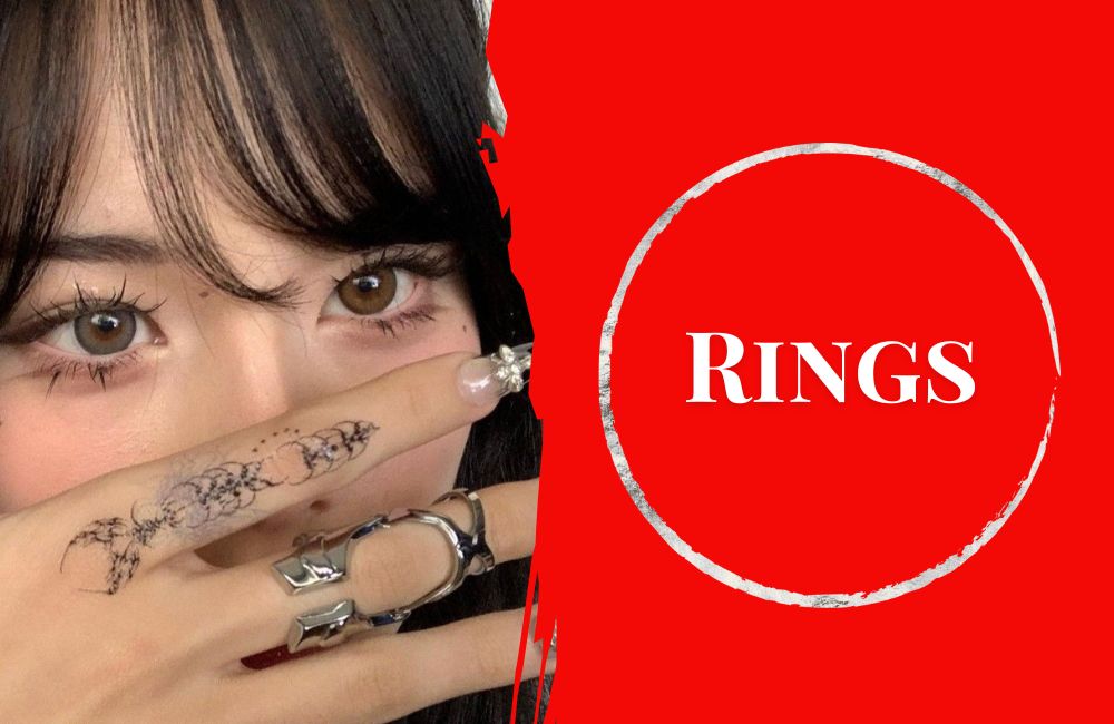 Stylish silver ring being worn by Asian girl. This image with the silver ring serves as button to a category page for rings.